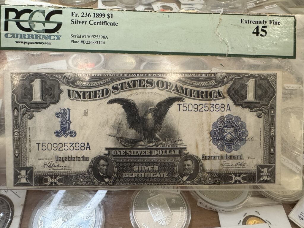 Inicio TodoPrecio.com 40 Billete de $1 Dólar Black Eagle 1899 PCGS XF45 Águila Negra Sello Azul