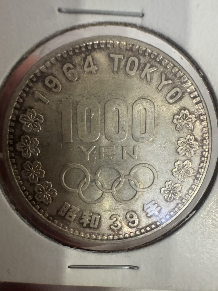 Inicio TodoPrecio.com 12 1000 Yenes ¥ Japón 1964 Tokio Olimpiadas Moneda de Plata Monte Fuji