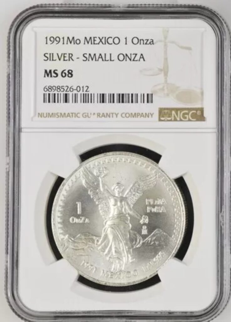 Inicio TodoPrecio.com 9 1991 Mo 1 Oz Plata Mexico Libertad SMALL OnZa NGC MS68 Tipo 2 , Mula, Letras MiXtAs