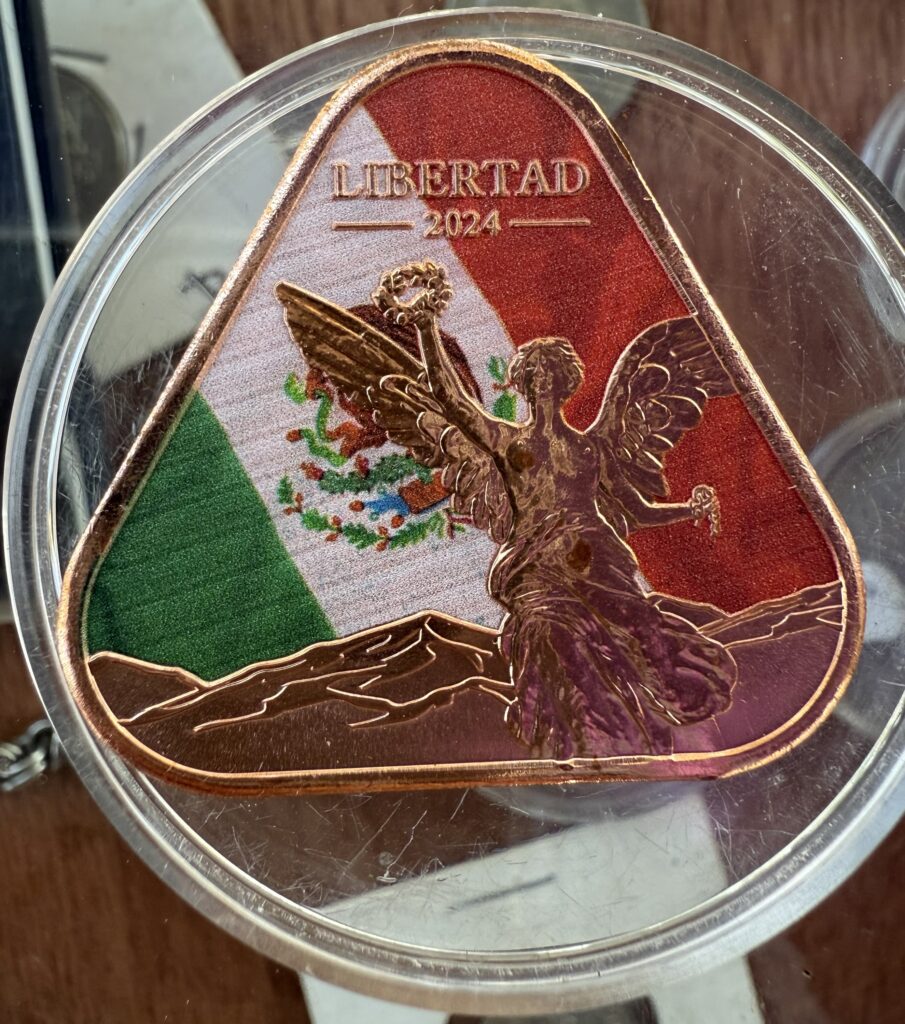 Inicio TodoPrecio.com 25 1 Oz. Cobre Triangular Libertad 2024 Colorizado AVDP