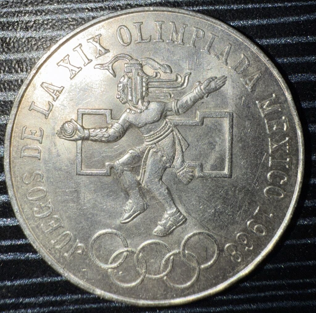 Inicio TodoPrecio.com 12 $25 Pesos Plata .720 Juegos de la XIX Olimpiada México 1968 Error Aro Bajo Lengua Curva