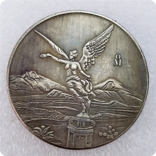 Moneda Diseño Tipo Angel de la Libertad