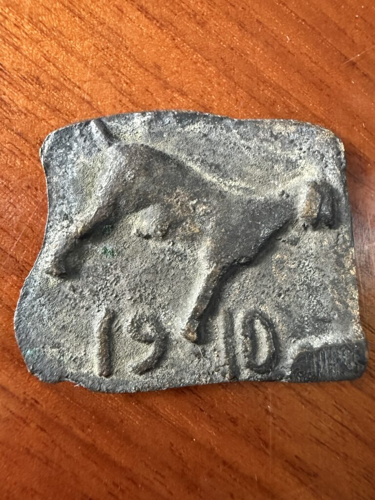 Souvenir de ficha de Hacienda