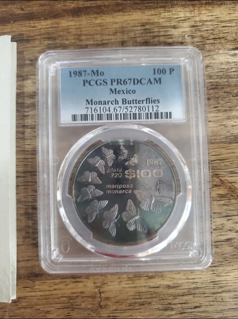 Ofertas 🔥 116 100 Pesos Mariposa Monarca 1987 WWF Mexico PCGS PF67DCAM