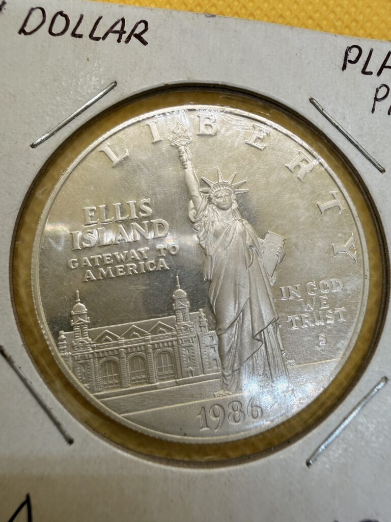 Inicio TodoPrecio.com 11 1 Dólar Onza de Plata .999 Proof 1986 Ellis Island | USA