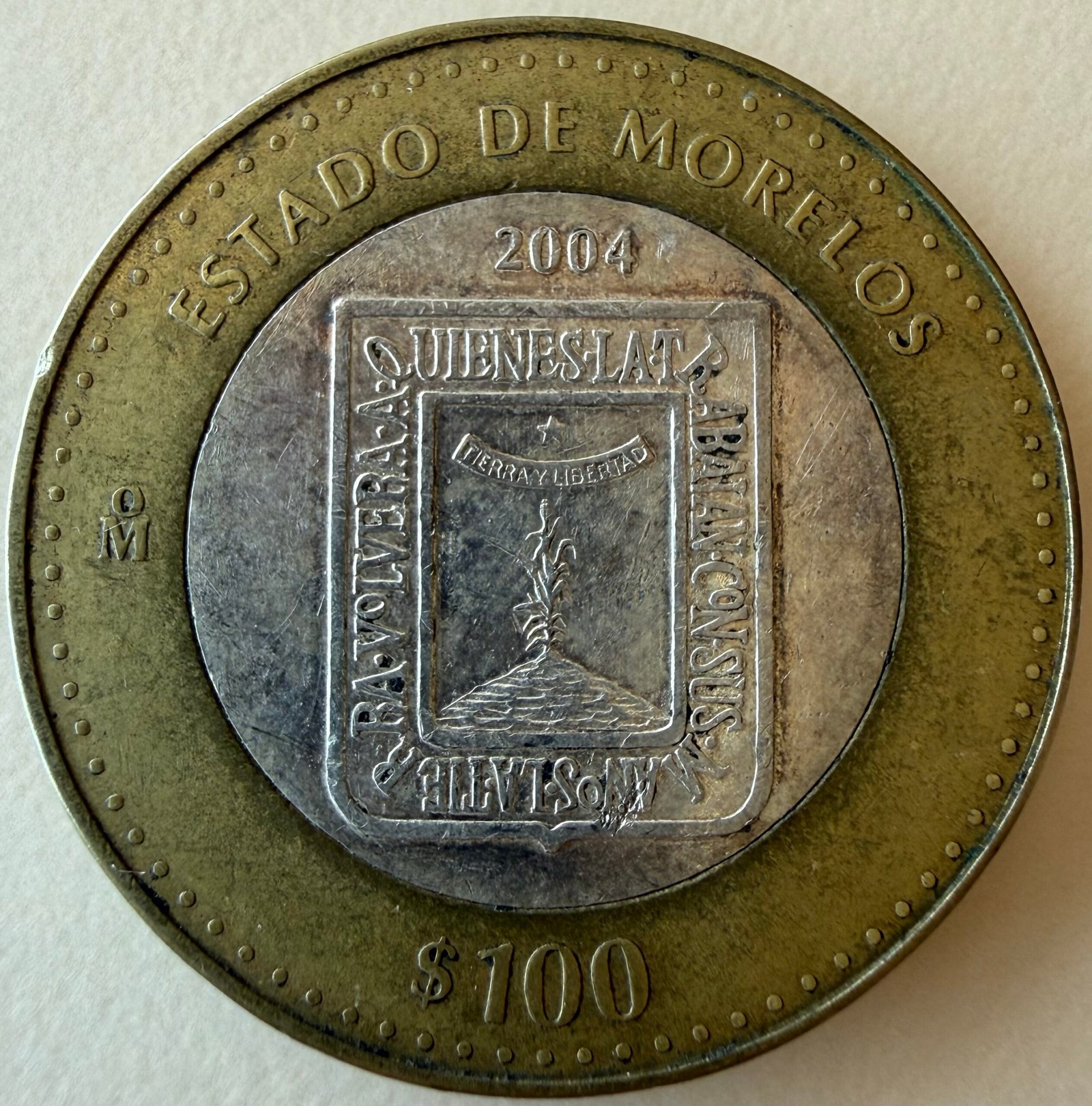 100 Pesos 2004 Bimetalica Morelos | Primera Fase 1 100 Pesos 2004 Bimetalica Morelos | Primera Fase