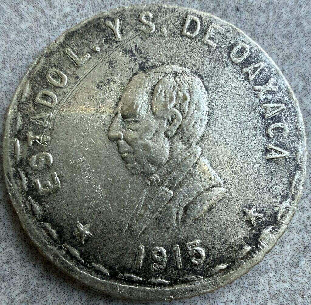 Inicio TodoPrecio.com 48 $1 Peso Oaxaca 1915 Plata Benito Juárez | Revolución Mexicana