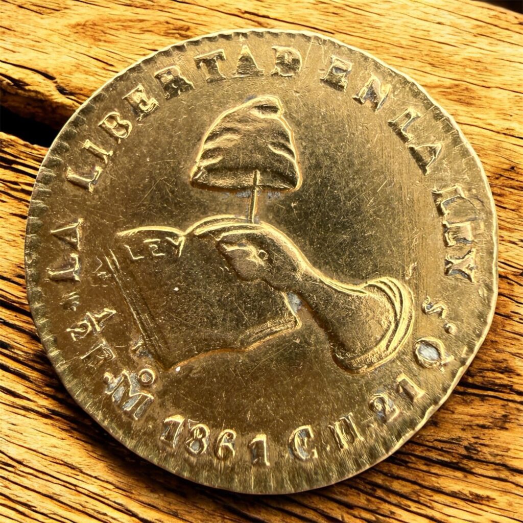 Inicio TodoPrecio.com 32 1/2 Medio Escudo 🛡️ Oro 1861 CH Mo. México | La libertad en la ley