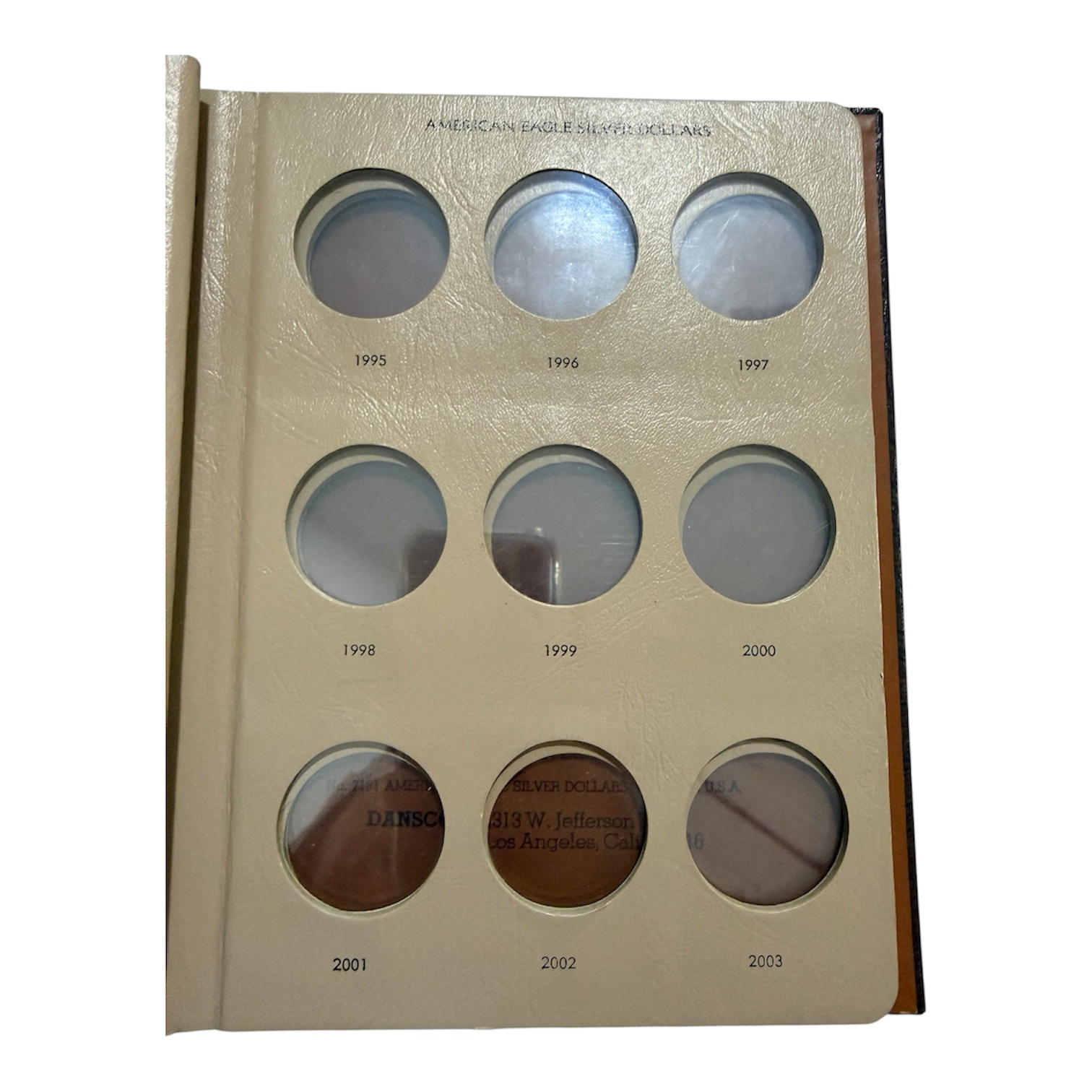 Álbum Dansco American Eagle Silver Dollars 1986–Fecha 6 photoroom 20260224 194340