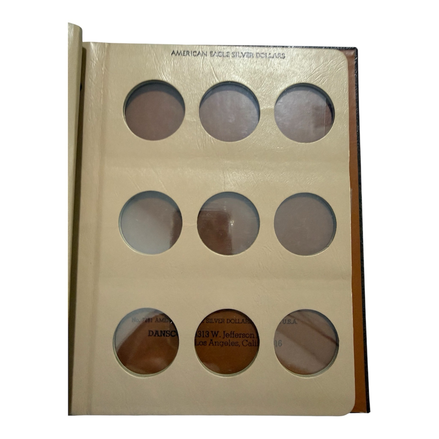 Álbum Dansco American Eagle Silver Dollars 1986–Fecha 4 photoroom 20260224 194431