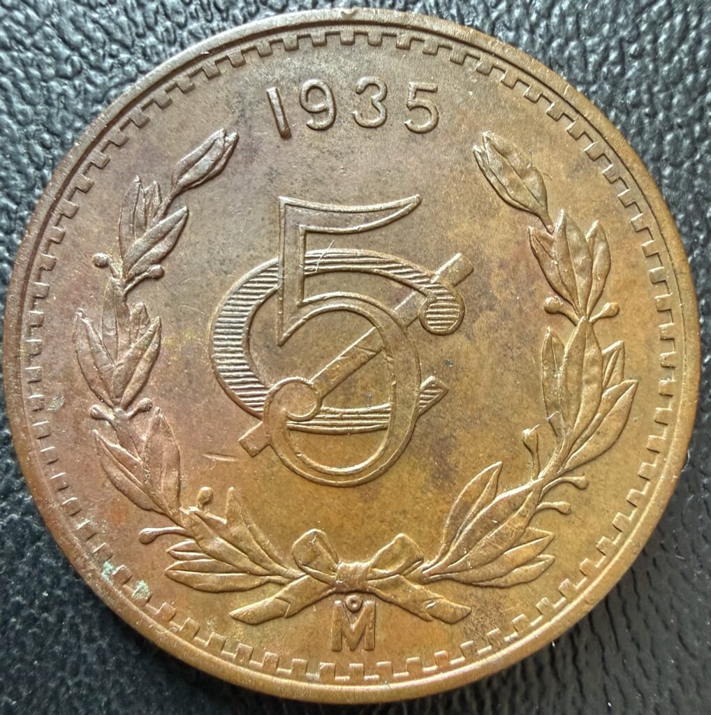 Inicio TodoPrecio.com 6 5 Centavos 1935 Monograma México Mo – Moneda de Bronce
